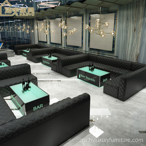 Современный кожаный диван в ночном клубе в форме U/L